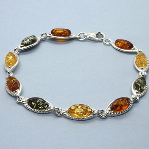 Amber and Silver Bracelet - fancy oval stones